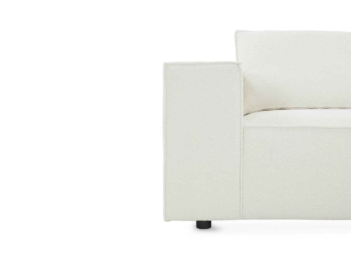 Canapé d'angle modulable en tissu effet peau de mouton blanc écru HARLEM - DécoInParis