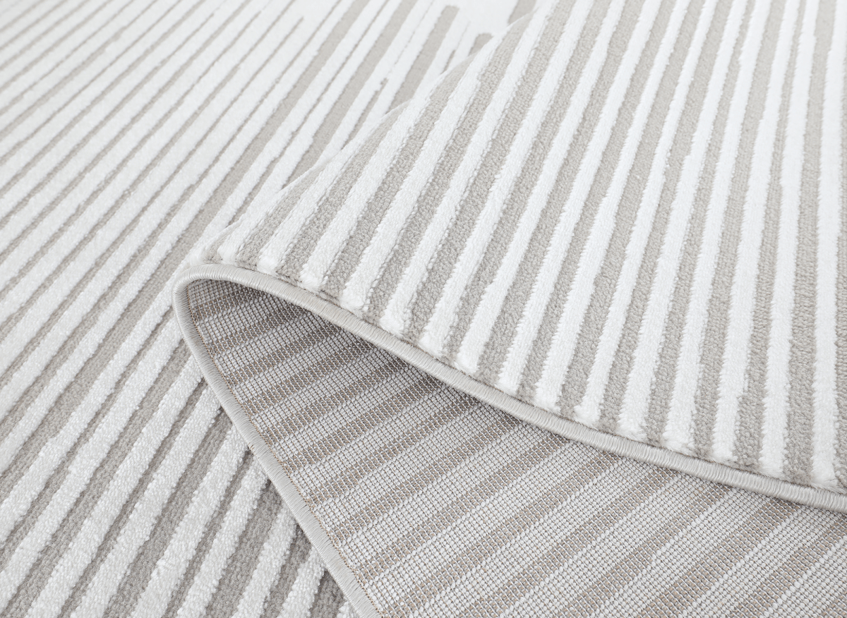 Tapis gris à lignes asymétriques 160 x 230 cm VENISE - DécoInParis