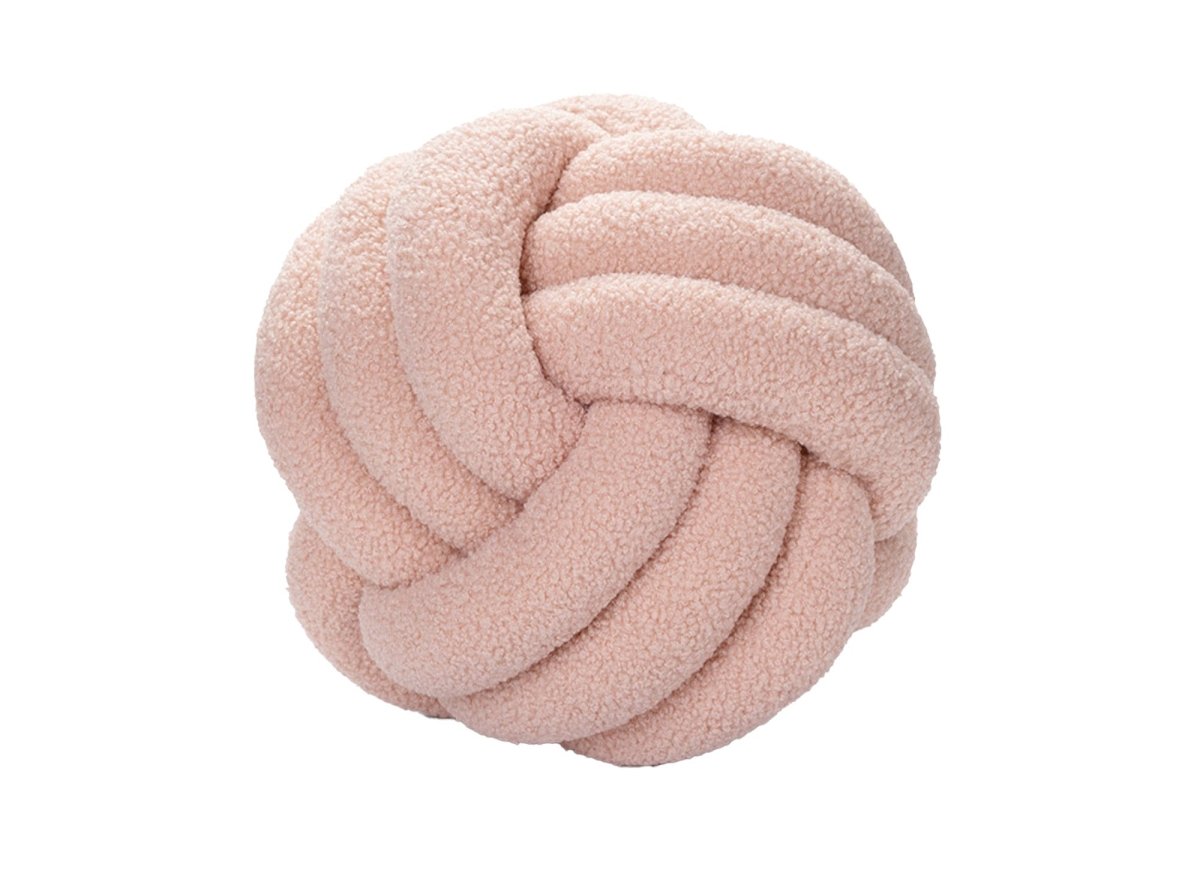 Coussin rond décoratif boule de nœud en effet peau de mouton rose NODUS - DécoInParis