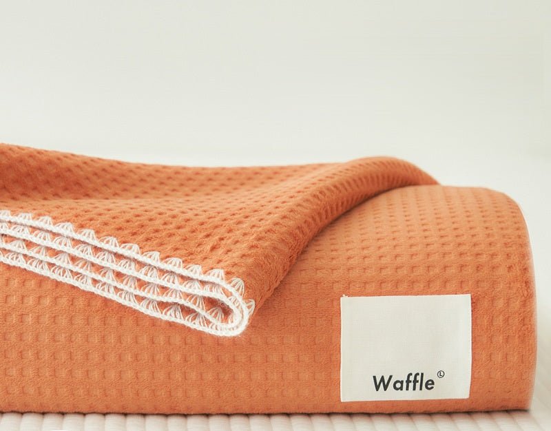 Plaid orange gaufré surpiqûres blanche 150 x 200 cm WAFFLE - DécoInParis